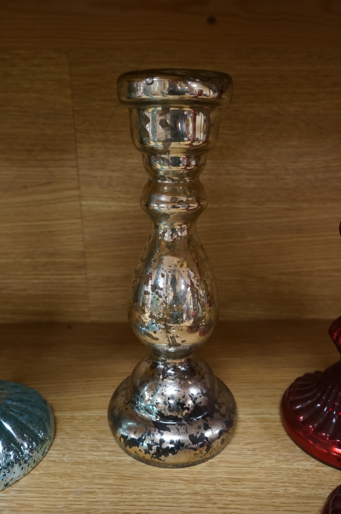 Three pairs of mirrored glass candlesticks and two small glass floral displays, largest 26cm high